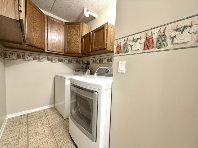 555 Graceland Ave Unit 505, Des Plaines, IL 60016 - laundry room featuring cabinet space, washing machine and dryer, a textured ceiling, and light flooring