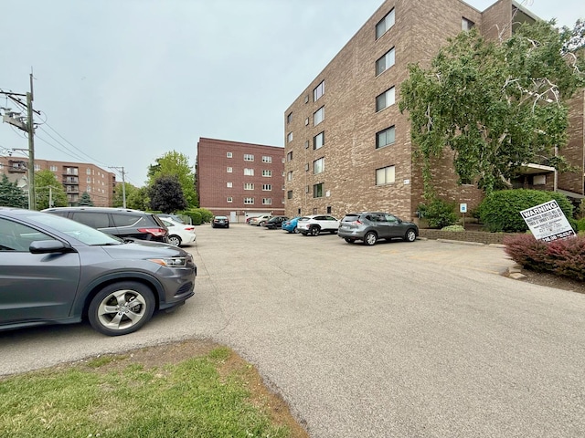 555 Graceland Ave Unit 505, Des Plaines, IL 60016 - view of building exterior featuring uncovered parking