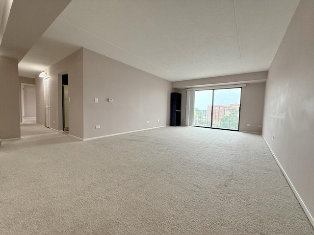 555 Graceland Ave Unit 505, Des Plaines, IL 60016 - spare room with light colored carpet and baseboards