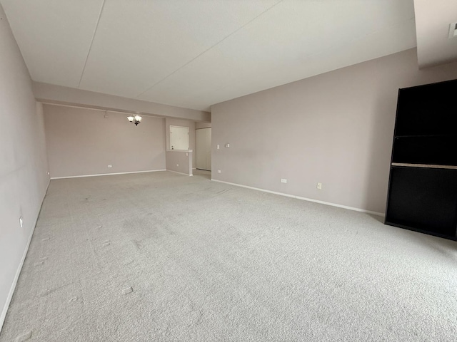555 Graceland Ave Unit 505, Des Plaines, IL 60016 - unfurnished room featuring light colored carpet and a chandelier