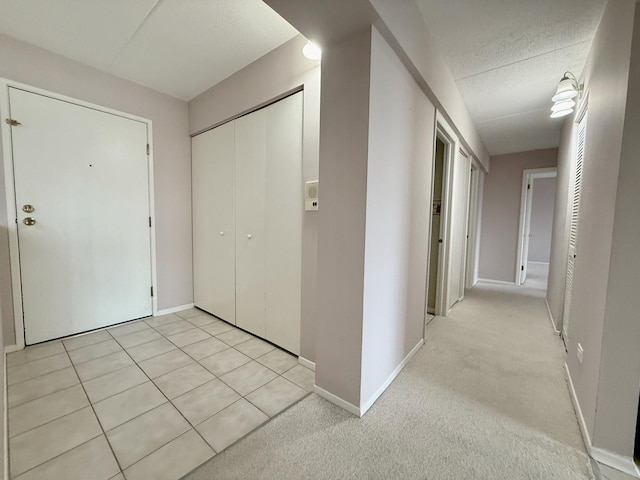 555 Graceland Ave Unit 505, Des Plaines, IL 60016 - hallway featuring a textured ceiling and light colored carpet