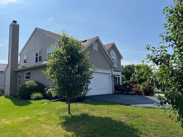 1312 Strawbridge Ct, Naperville, IL 60565 - view of home's exterior with driveway, a garage, and a lawn
