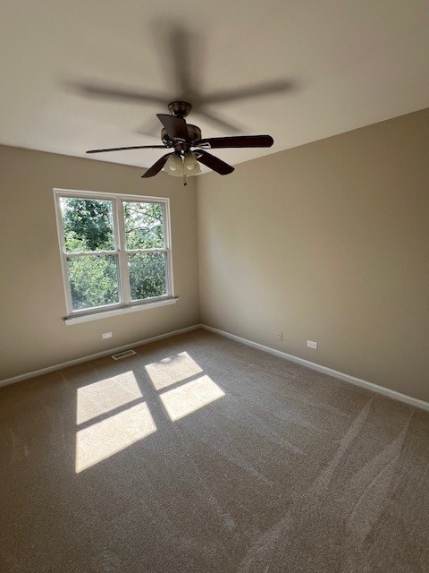 1312 Strawbridge Ct, Naperville, IL 60565 - carpeted spare room with baseboards and ceiling fan