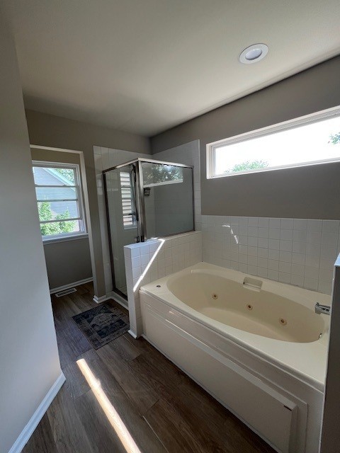 1312 Strawbridge Ct, Naperville, IL 60565 - bathroom with a jetted tub, healthy amount of natural light, wood finished floors, and a stall shower