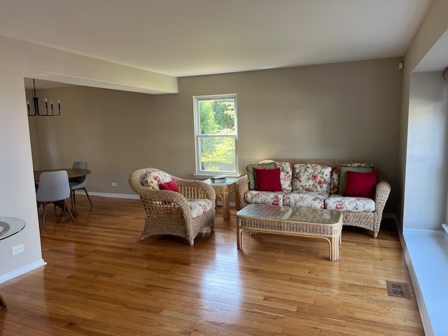 1312 Strawbridge Ct, Naperville, IL 60565 - living room featuring wood finished floors and baseboards
