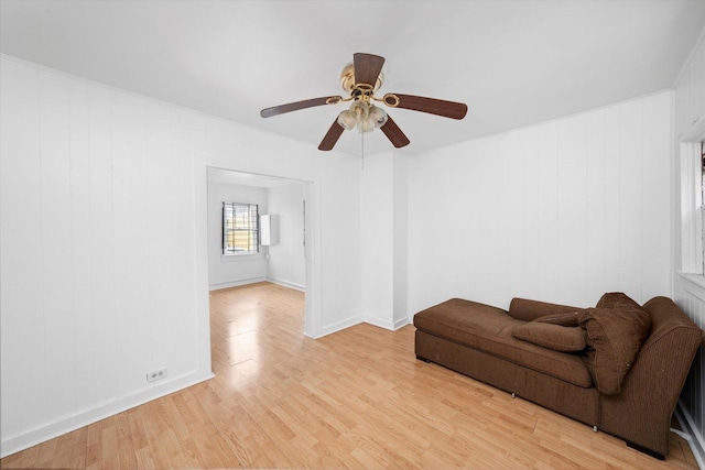 2142 N Mobile Ave, Chicago, IL 60639 - living area with light wood-type flooring and a ceiling fan
