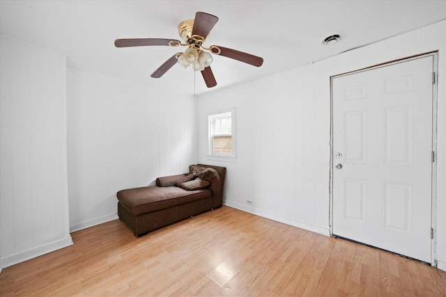 2142 N Mobile Ave, Chicago, IL 60639 - unfurnished room featuring light wood-style floors and a ceiling fan