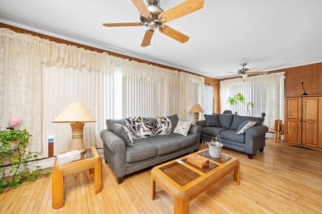 2142 N Mobile Ave, Chicago, IL 60639 - living room with a ceiling fan, hardwood / wood-style floors, and ornamental molding