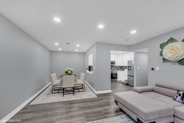 2600 Brookwood Way Dr Unit 111A, Rolling Meadows, IL 60008 - living room featuring dark wood finished floors and recessed lighting