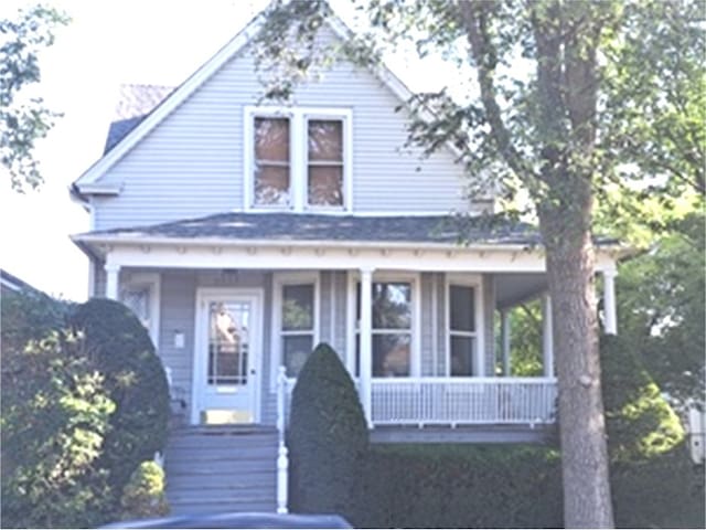 5922 W Dakin St, Chicago, IL 60634 - view of front of house with a porch
