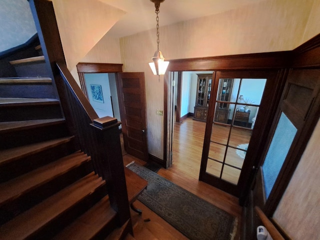 5922 W Dakin St, Chicago, IL 60634 - stairway featuring wood finished floors