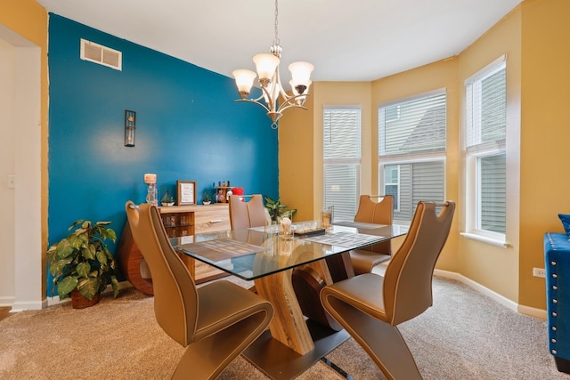 72 Kenneth Ave, Matteson, IL 60443 - dining area with carpet floors and a chandelier