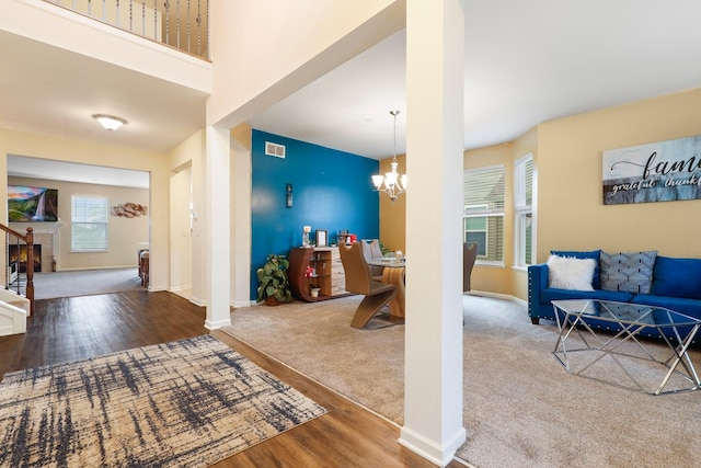 72 Kenneth Ave, Matteson, IL 60443 - carpeted foyer entrance featuring a chandelier, wood finished floors, and stairs