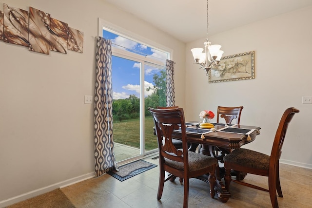 72 Kenneth Ave, Matteson, IL 60443 - dining room featuring baseboards and a chandelier