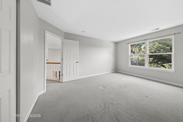 805 W Mystic Ln, Romeoville, IL 60446 - carpeted empty room featuring baseboards