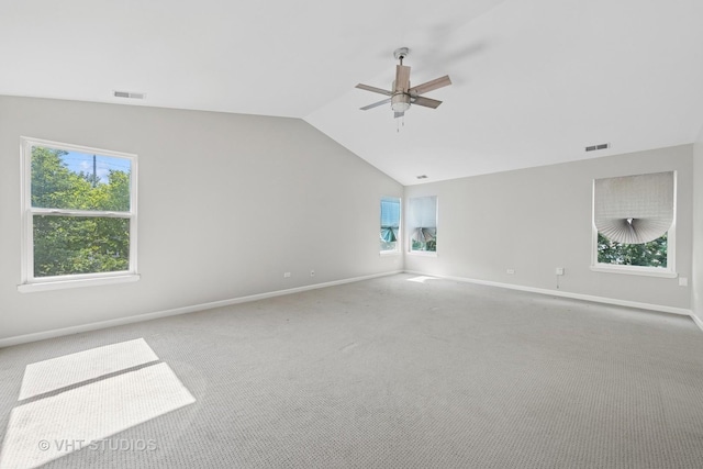 805 W Mystic Ln, Romeoville, IL 60446 - unfurnished room with plenty of natural light, lofted ceiling, a ceiling fan, and carpet flooring