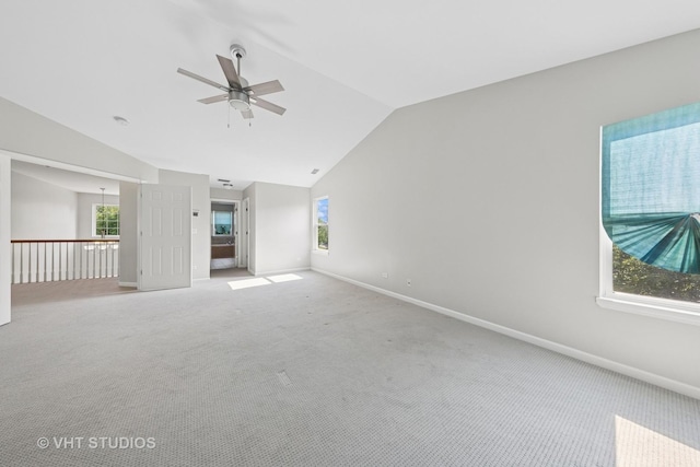 805 W Mystic Ln, Romeoville, IL 60446 - spare room featuring vaulted ceiling, a ceiling fan, and light carpet