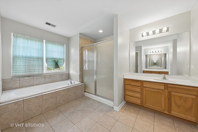 805 W Mystic Ln, Romeoville, IL 60446 - full bathroom featuring tile patterned flooring, vanity, a garden tub, and a stall shower