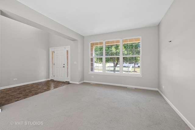 805 W Mystic Ln, Romeoville, IL 60446 - carpeted foyer featuring baseboards