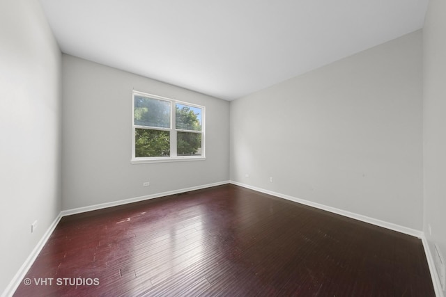 805 W Mystic Ln, Romeoville, IL 60446 - spare room featuring hardwood / wood-style floors and baseboards