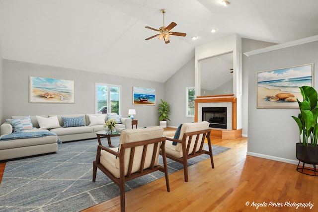 1803 N Woodlawn Park Ave, Mchenry, IL 60051 - living room featuring a ceiling fan, light wood finished floors, a fireplace, high vaulted ceiling, and recessed lighting
