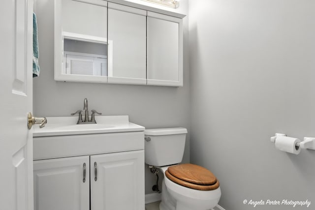 1803 N Woodlawn Park Ave, Mchenry, IL 60051 - bathroom with vanity and toilet