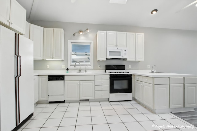 1803 N Woodlawn Park Ave, Mchenry, IL 60051 - kitchen with white appliances, light countertops, and white cabinets