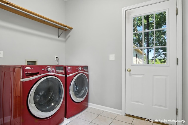 1803 N Woodlawn Park Ave, Mchenry, IL 60051 - laundry room with washer and dryer and light tile patterned flooring
