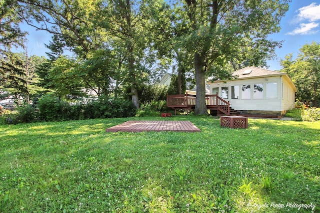 1803 N Woodlawn Park Ave, Mchenry, IL 60051 - view of grassy yard with a wooden deck