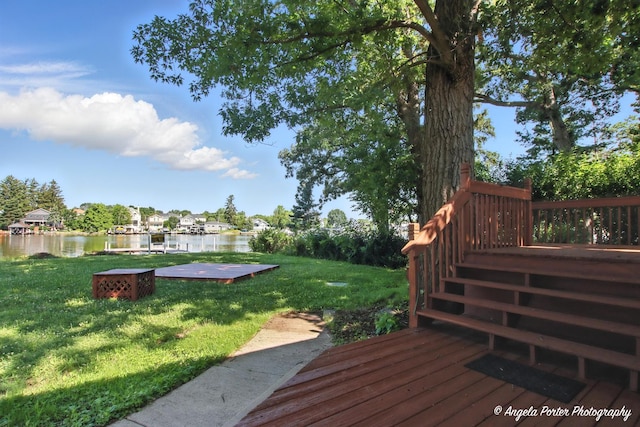 1803 N Woodlawn Park Ave, Mchenry, IL 60051 - wooden terrace featuring a water view and a lawn