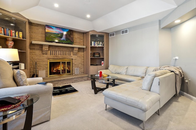 5932 W 75th Pl, Burbank, IL 60459 - living room featuring light carpet, built in features, a brick fireplace, and recessed lighting
