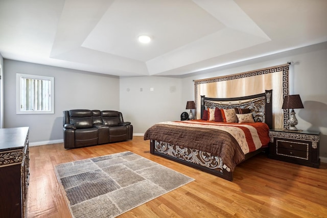 5932 W 75th Pl, Burbank, IL 60459 - bedroom with a raised ceiling and wood finished floors