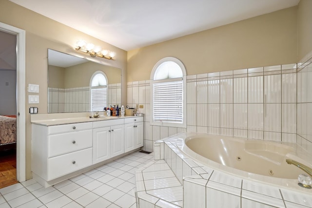 5932 W 75th Pl, Burbank, IL 60459 - full bath featuring a whirlpool tub, vanity, tile patterned flooring, and tile walls