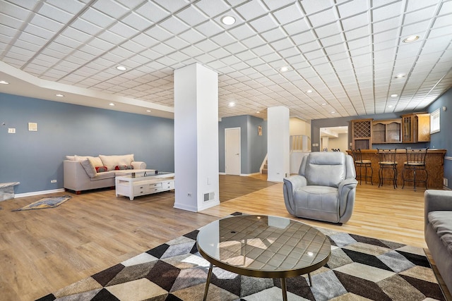 5932 W 75th Pl, Burbank, IL 60459 - living area with bar area, light wood-type flooring, and recessed lighting