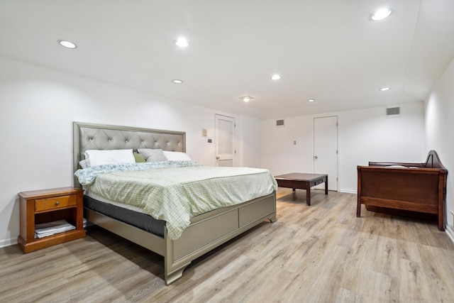 5932 W 75th Pl, Burbank, IL 60459 - bedroom with light wood finished floors and recessed lighting
