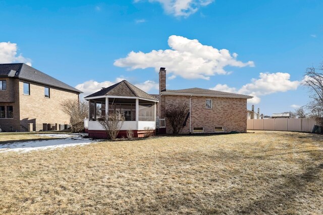 5932 W 75th Pl, Burbank, IL 60459 - rear view of property featuring a sunroom, a chimney, and brick siding