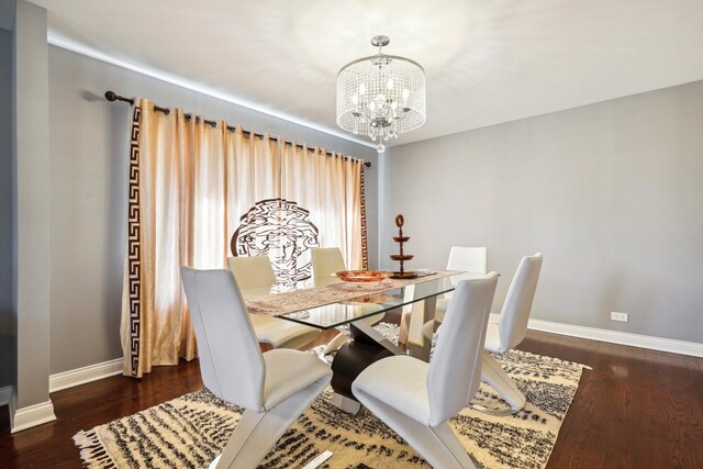 5932 W 75th Pl, Burbank, IL 60459 - dining space featuring a chandelier and wood finished floors
