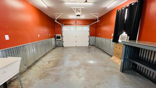 113 E Seminole St, Dwight, IL 60420 - garage featuring a wainscoted wall and wood walls