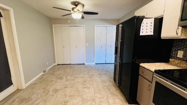 113 E Seminole St, Dwight, IL 60420 - kitchen featuring stainless steel appliances, ceiling fan, backsplash, white cabinetry, and light countertops