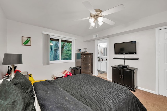 2003 Tall Oaks Dr Unit 2B, Aurora, IL 60505 - carpeted bedroom with ensuite bath and ceiling fan
