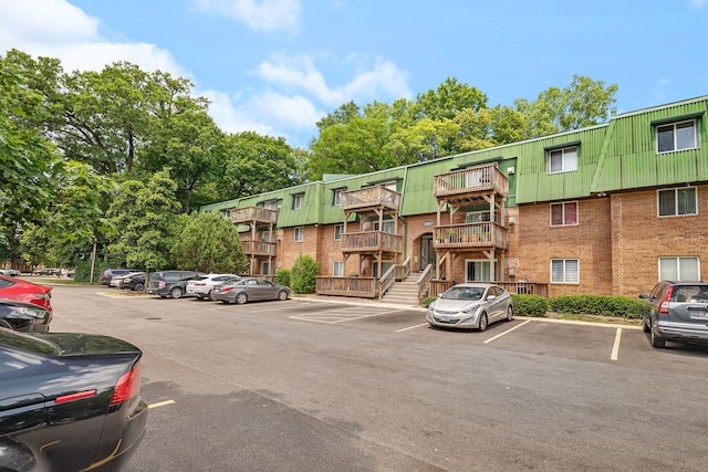 2003 Tall Oaks Dr Unit 2B, Aurora, IL 60505 - view of property featuring uncovered parking