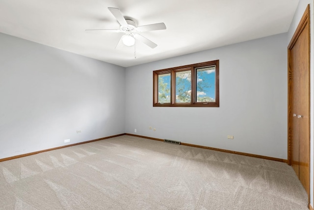 7340 Mimosa Dr, Orland Park, IL 60462 - empty room featuring light colored carpet and ceiling fan