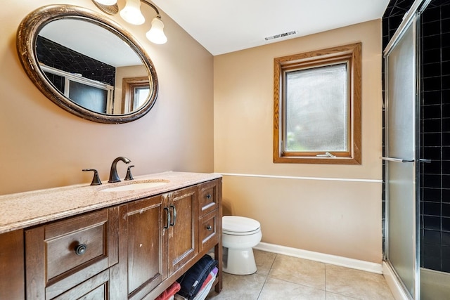 7340 Mimosa Dr, Orland Park, IL 60462 - full bath featuring vanity, tile patterned floors, and a shower with door
