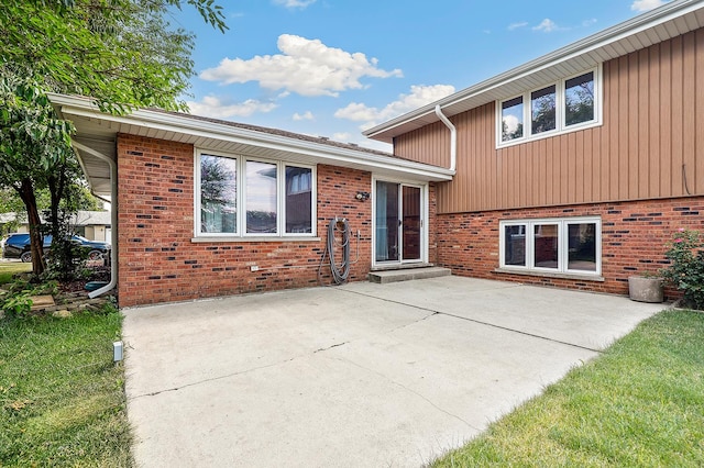 7340 Mimosa Dr, Orland Park, IL 60462 - back of property with a patio area and brick siding