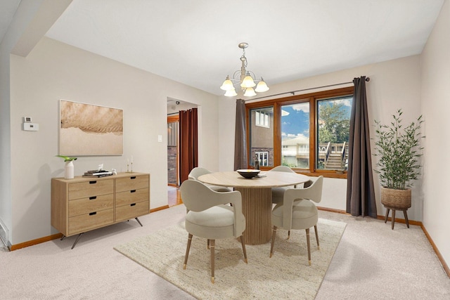 7340 Mimosa Dr, Orland Park, IL 60462 - dining space with light colored carpet and a chandelier