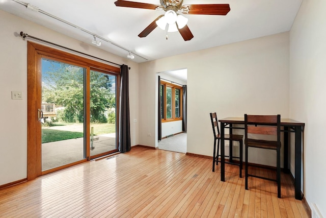 7340 Mimosa Dr, Orland Park, IL 60462 - dining space featuring light wood-style flooring, ceiling fan, and rail lighting