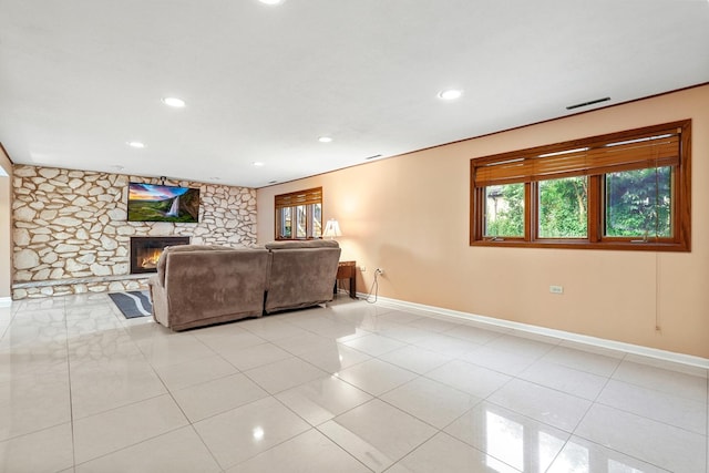 7340 Mimosa Dr, Orland Park, IL 60462 - living area featuring healthy amount of natural light, recessed lighting, a fireplace, and light tile patterned flooring