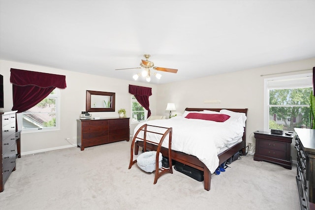 428 Linsey Ave, Schaumburg, IL 60194 - bedroom with light carpet, multiple windows, and a ceiling fan