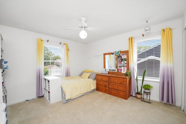 428 Linsey Ave, Schaumburg, IL 60194 - bedroom with multiple windows, light carpet, and a ceiling fan