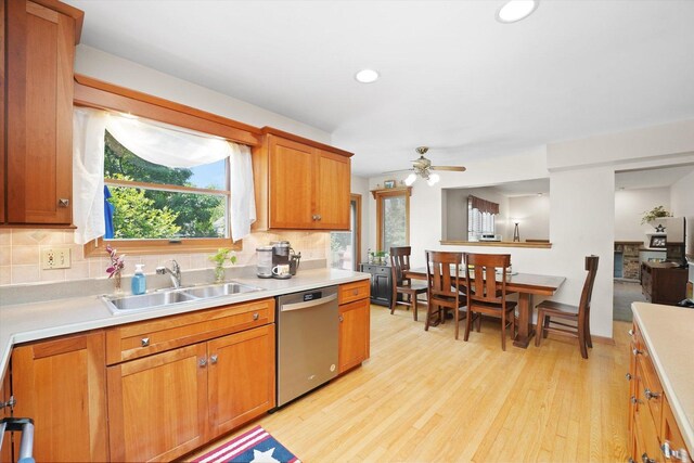 428 Linsey Ave, Schaumburg, IL 60194 - kitchen featuring stainless steel dishwasher, light wood-style flooring, light countertops, tasteful backsplash, and recessed lighting